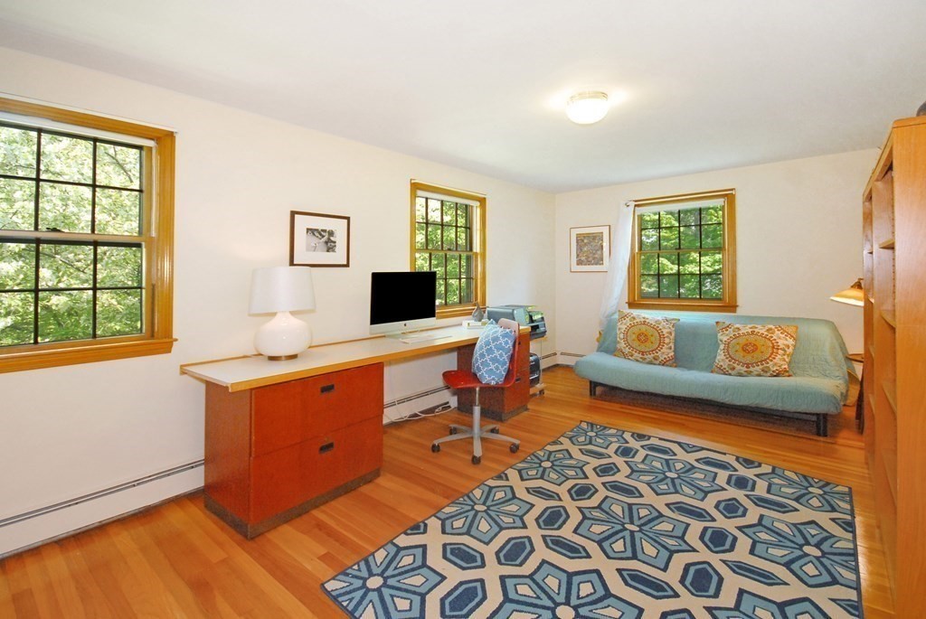 4 Farrar Road Lincoln, MA 01773 - Photo 22 of 32 a living room with furniture and a window