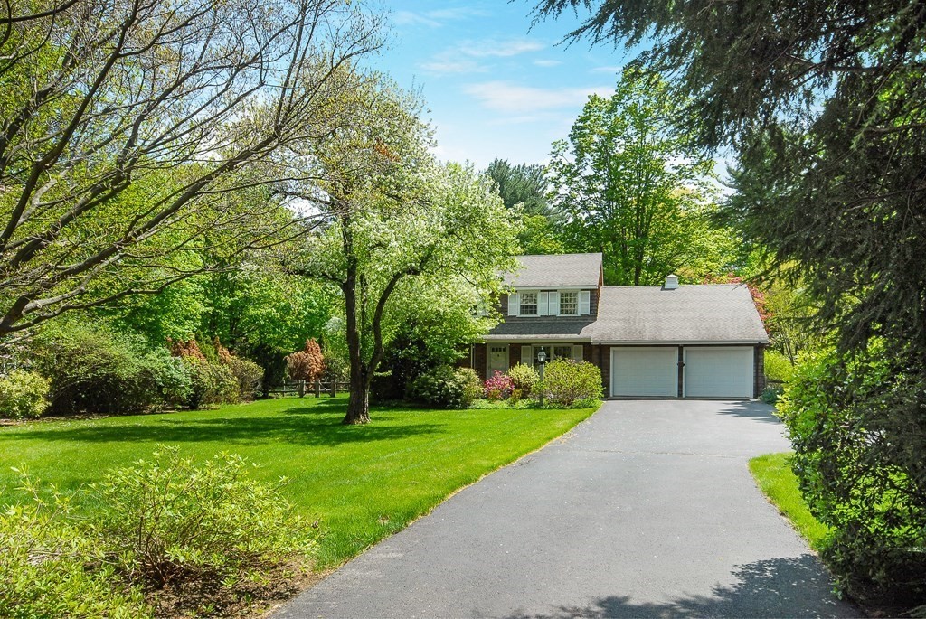 4 Farrar Road Lincoln, MA 01773 - Photo 3 of 32 a front view of a house with garden