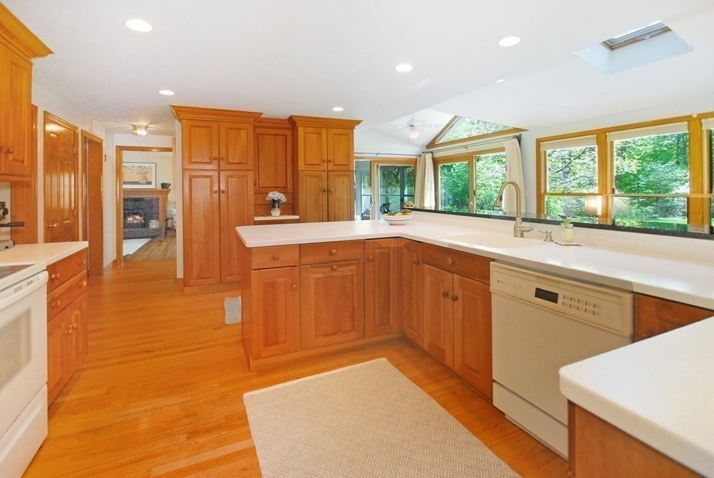 4 Farrar Road Lincoln, MA 01773 - Photo 7 of 32 a large kitchen with kitchen island granite countertop a large window