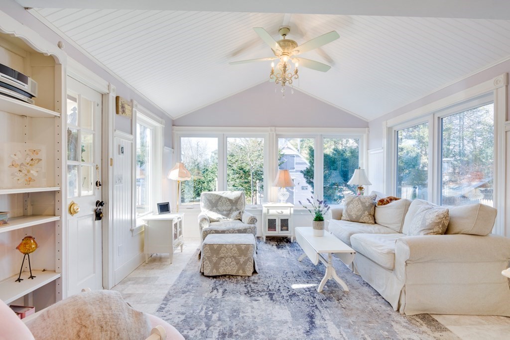 227 Warren Street Needham, MA 02492 - Photo 12 of 36 a living room with furniture and a large window