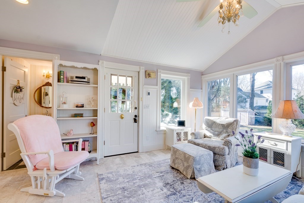 227 Warren Street Needham, MA 02492 - Photo 14 of 36 a living room with furniture and a window