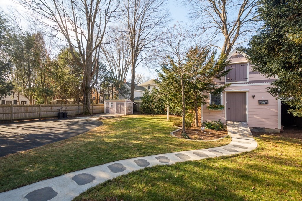 227 Warren Street Needham, MA 02492 - Photo 29 of 36 a view of yard with swimming pool and trees
