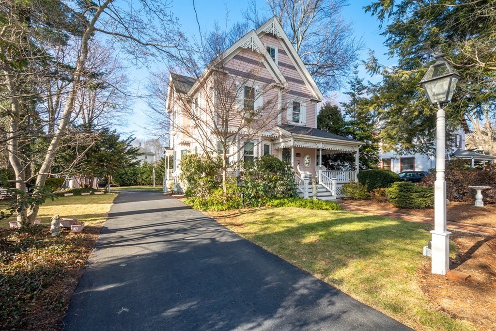 227 Warren Street Needham, MA 02492 - Photo 32 of 36 a view of a house with yard and sitting area