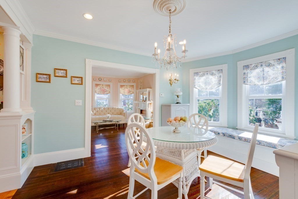 227 Warren Street Needham, MA 02492 - Photo 7 of 36 a view of a dining room with furniture window and wooden floor