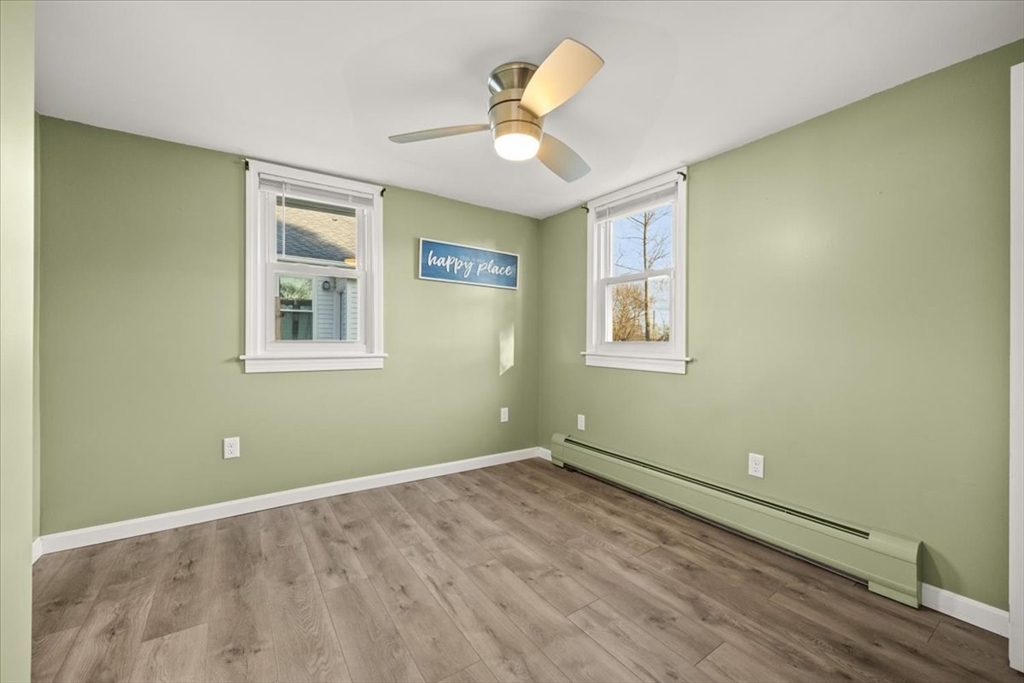 24 Harvard Street Fairhaven, MA 02719 - Photo 24 of 31 a view of empty room with wooden floor and fan