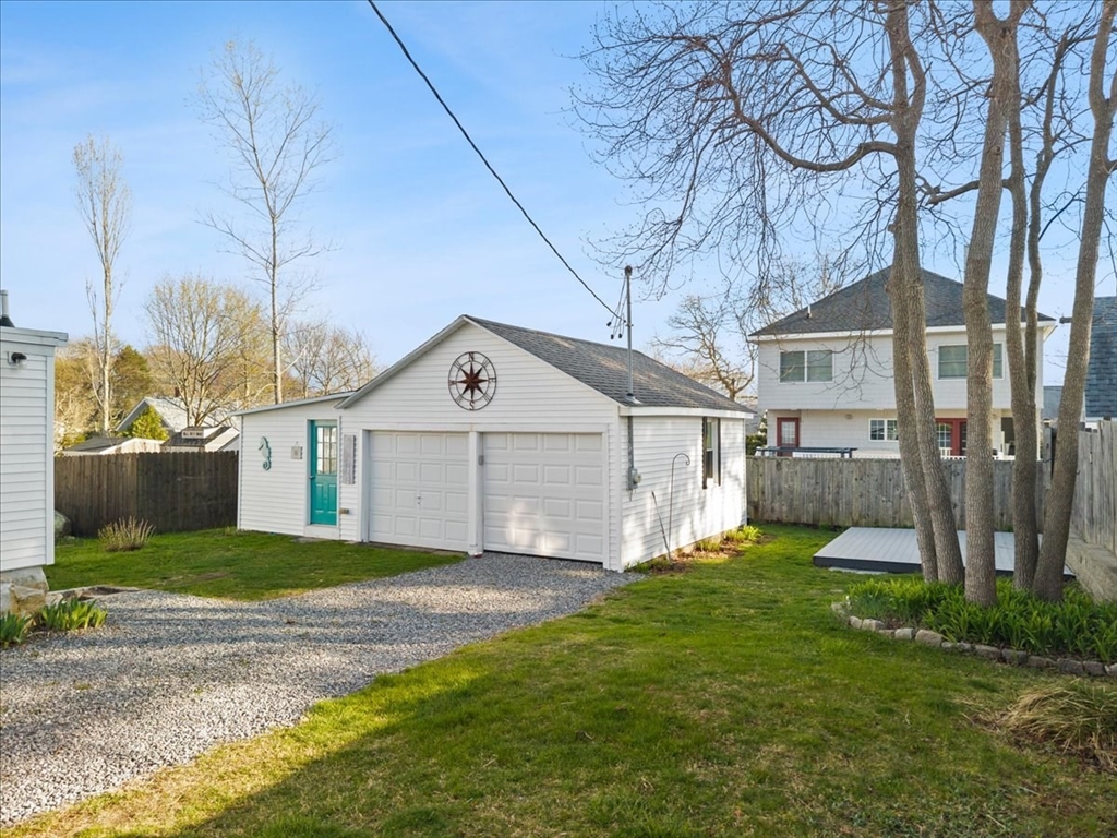 24 Harvard Street Fairhaven, MA 02719 - Photo 3 of 31 a view of a back yard of the house