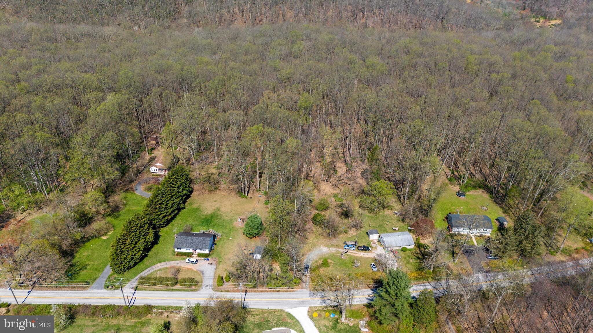 17346 Big Falls Road Monkton, MD 21111 - Photo 4 of 10 a view of residential houses with yard