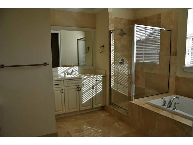 105 Via Floresta Drive, Unit 105 Boca Raton, FL 33487 - Photo 11 of 22 Bathroom Master.