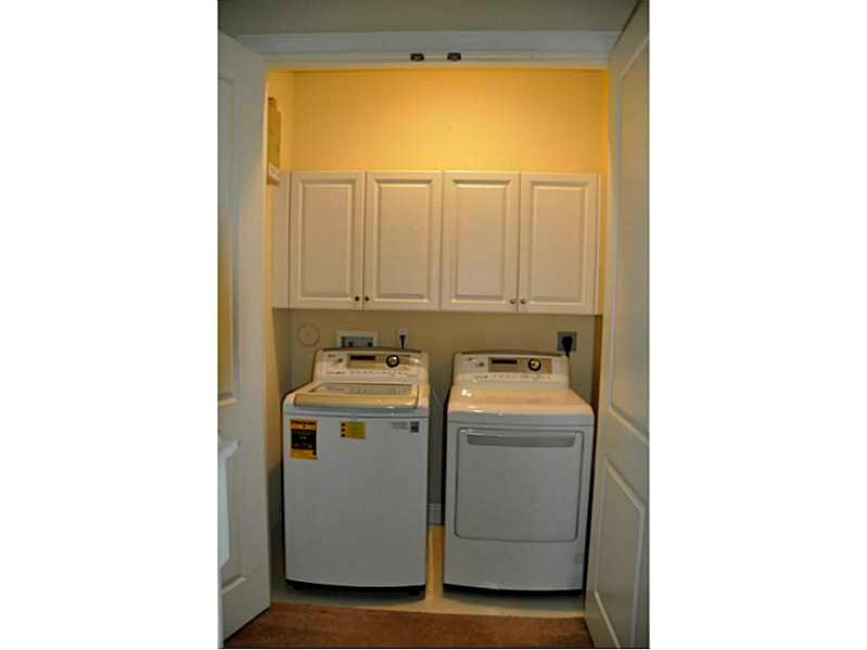 105 Via Floresta Drive, Unit 105 Boca Raton, FL 33487 - Photo 16 of 22 Laundry Room.