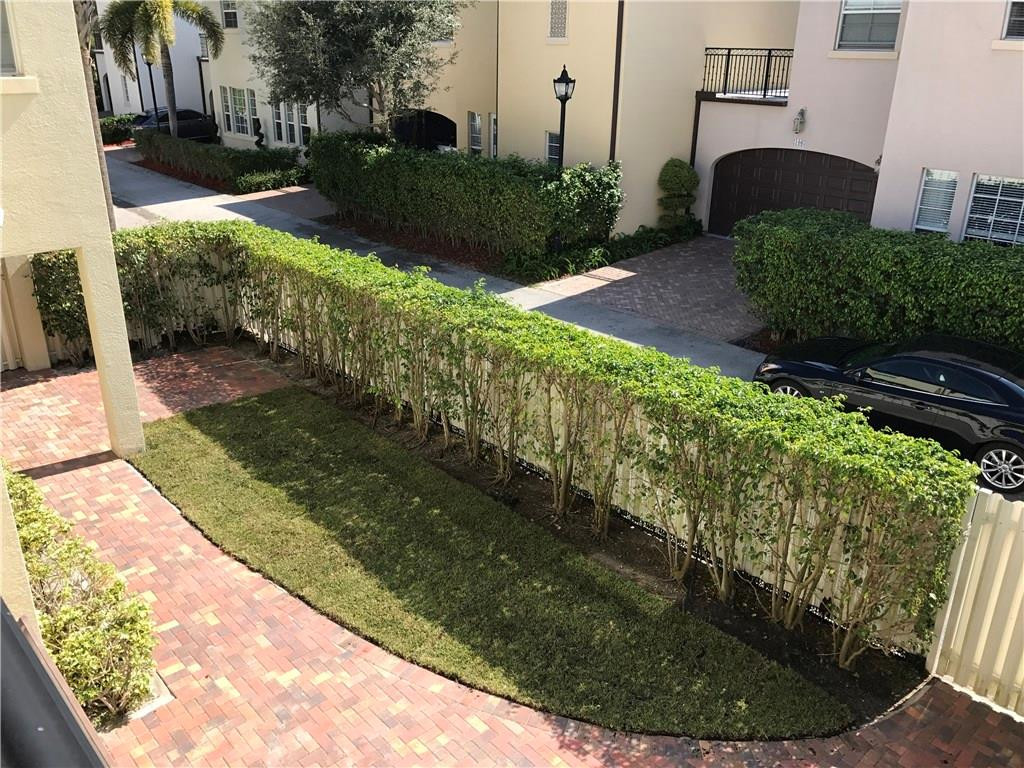 105 Via Floresta Drive, Unit 105 Boca Raton, FL 33487 - Photo 8 of 22 Private fenced backyard with gate