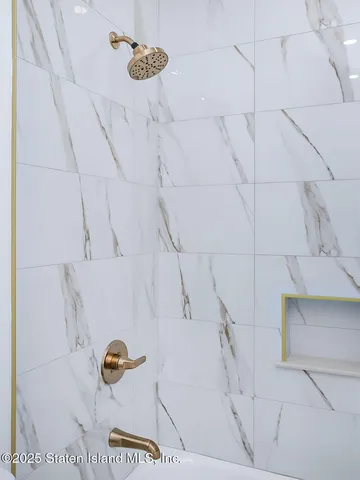 a bed room with a bed and a dresser