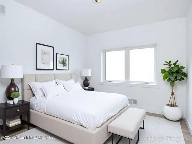 a large kitchen with stainless steel appliances granite countertop a sink a stove a refrigerator and a cabinets