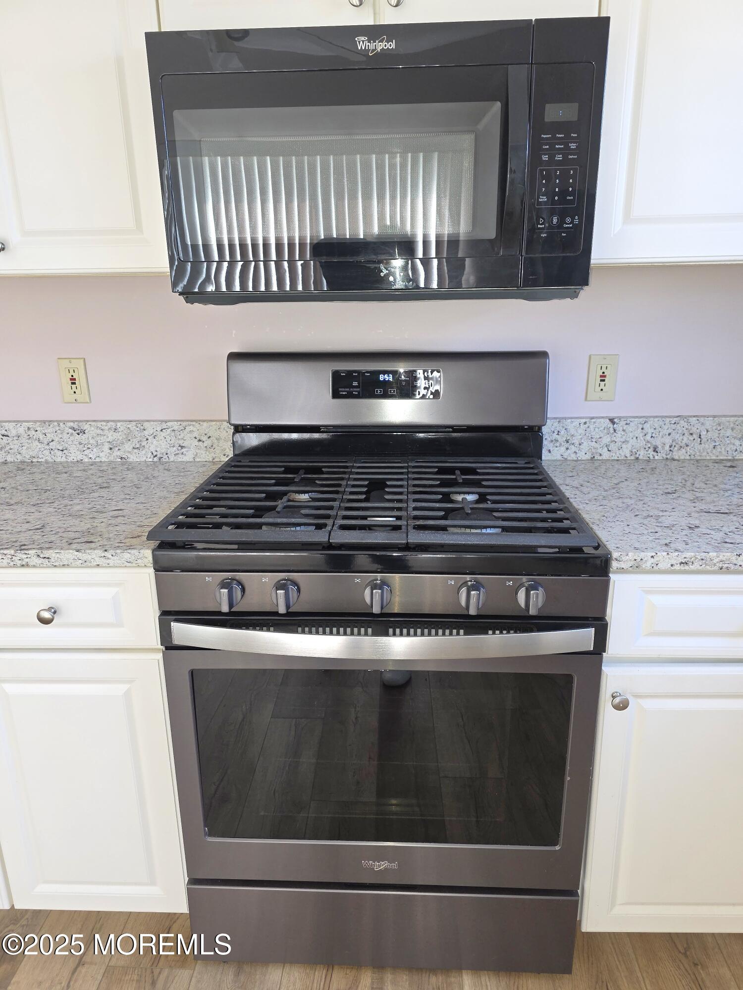 61 Sandpiper Road Barnegat, NJ 08005 - Photo 17 of 44 a stove top oven sitting inside of a kitchen