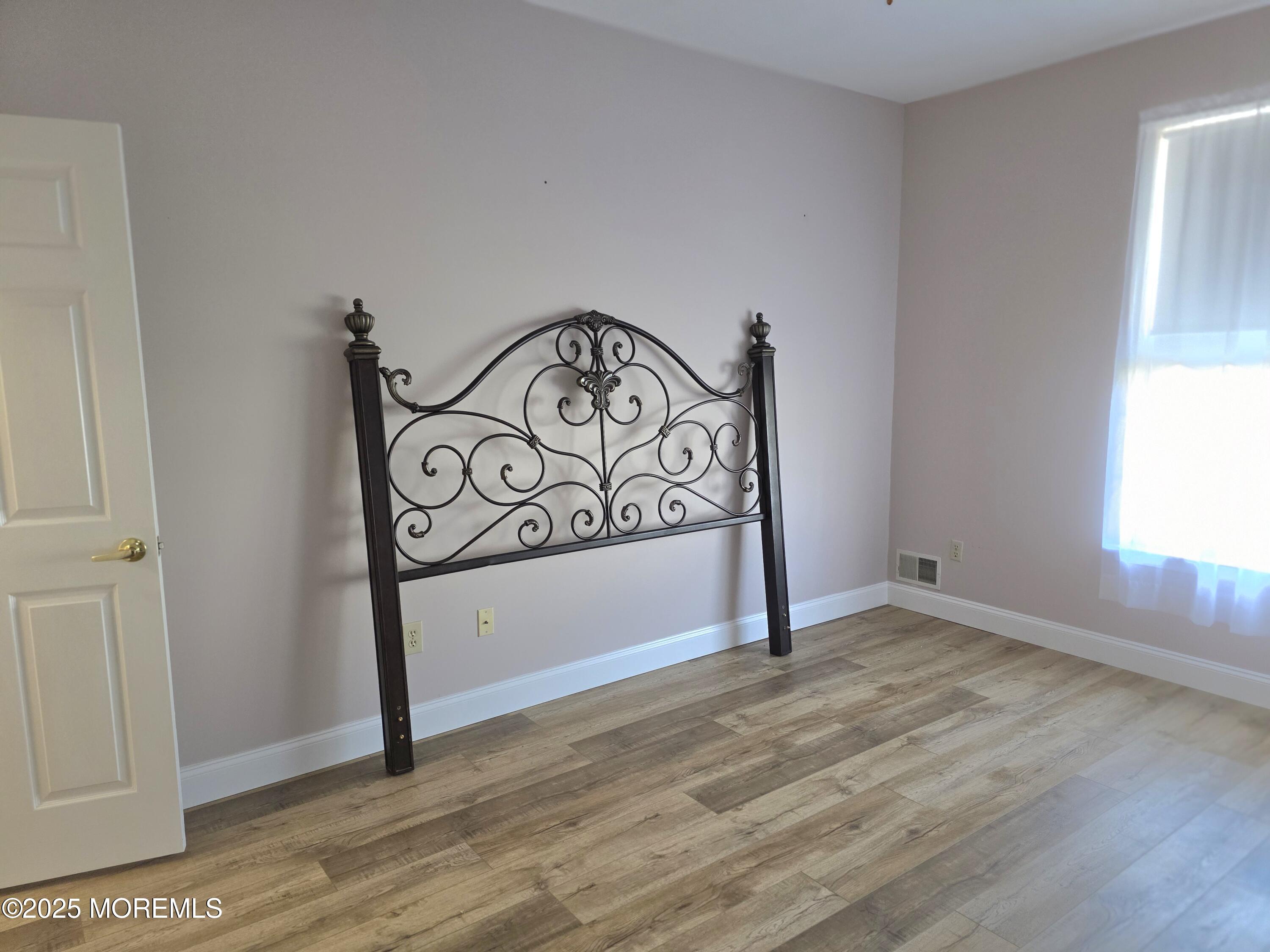 61 Sandpiper Road Barnegat, NJ 08005 - Photo 38 of 44 a view of a door and an entrance door