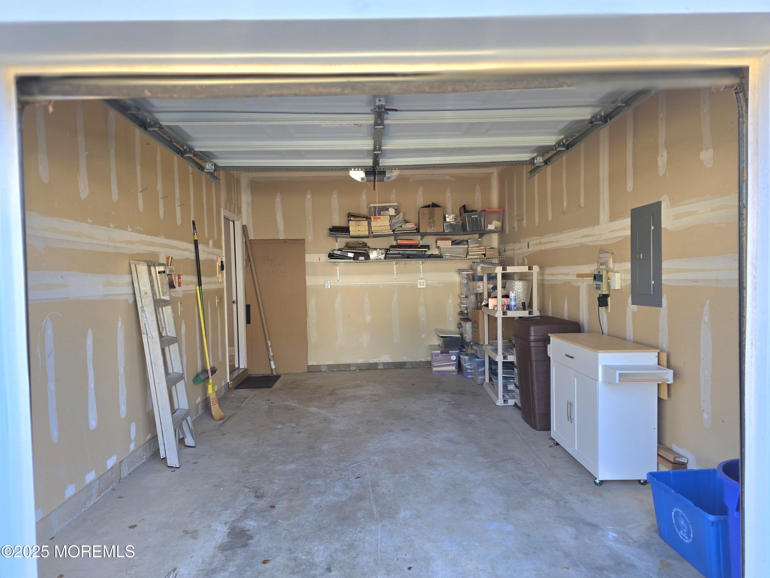 61 Sandpiper Road Barnegat, NJ 08005 - Photo 39 of 44 a kitchen with refrigerator and cabinets