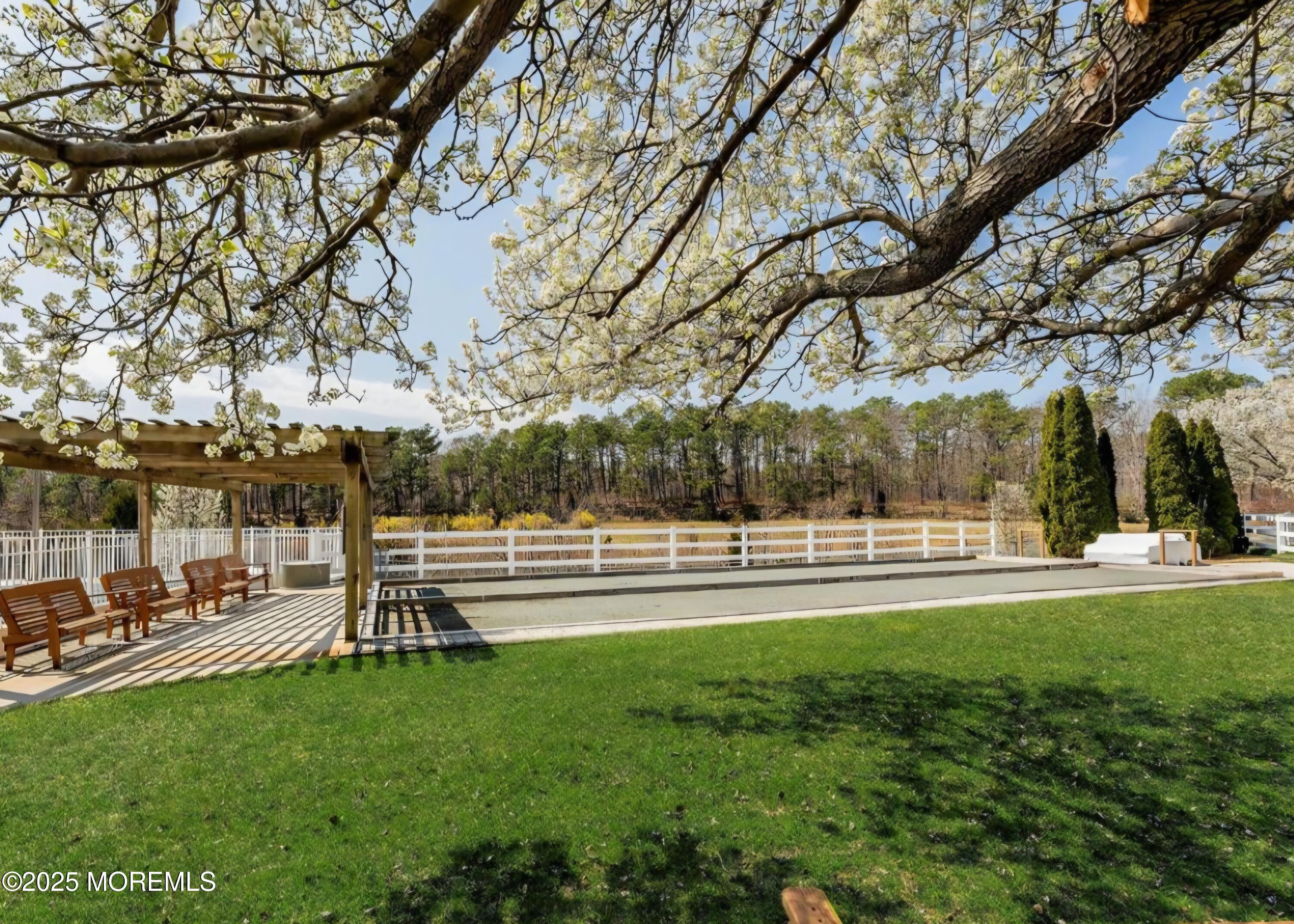 61 Sandpiper Road Barnegat, NJ 08005 - Photo 5 of 44 a view of outdoor space with garden and trees