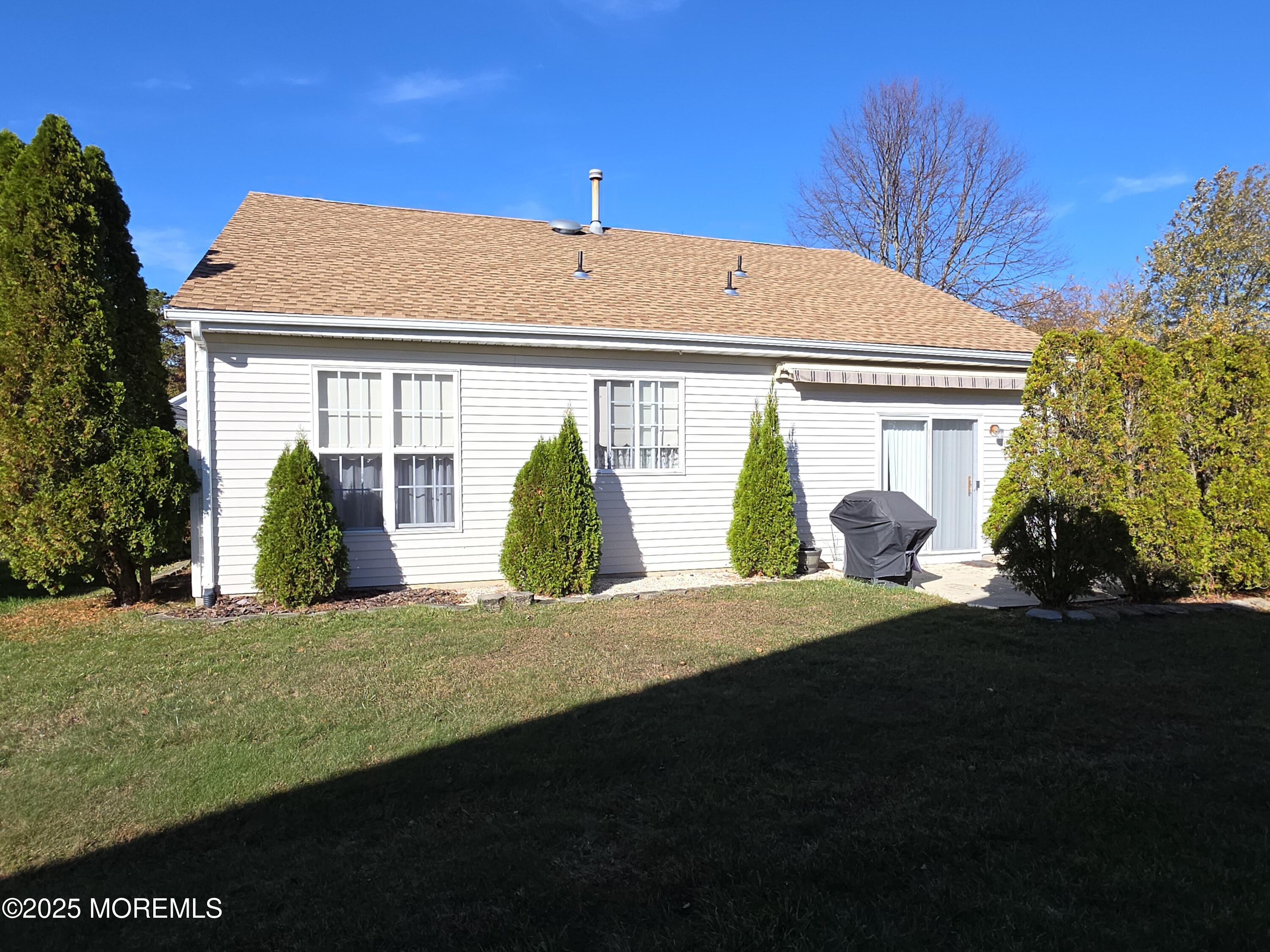 61 Sandpiper Road Barnegat, NJ 08005 - Photo 6 of 44 a view of a house with backyard and plants
