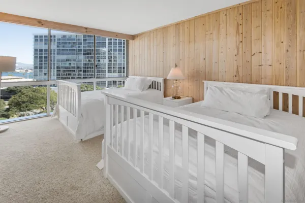 a bedroom with furniture and a window