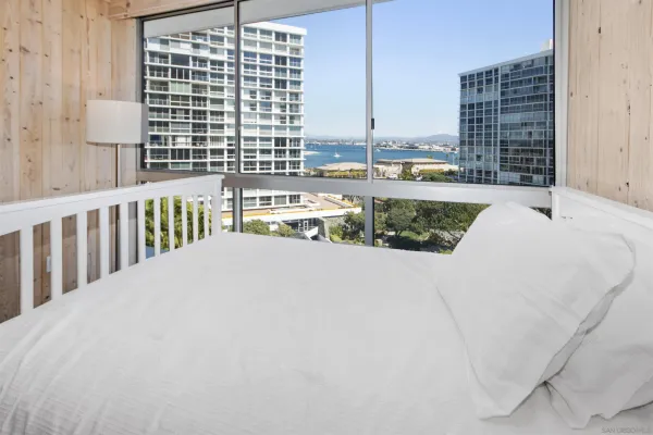 a bathroom with a double vanity sink toilet and shower