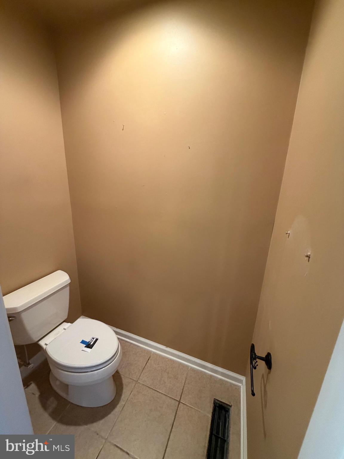 8617 Portsville Road Laurel, DE 19956 - Photo 15 of 47 a white toilet sitting next to a white wall