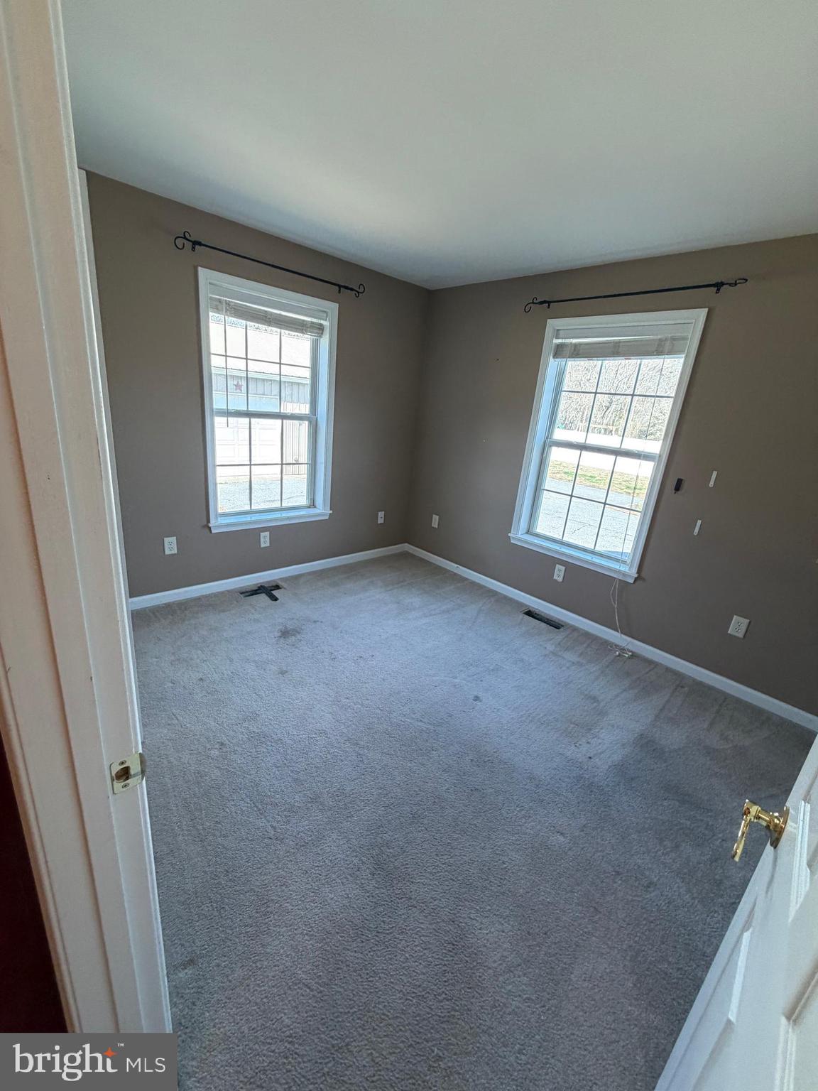 8617 Portsville Road Laurel, DE 19956 - Photo 19 of 47 an empty room with windows