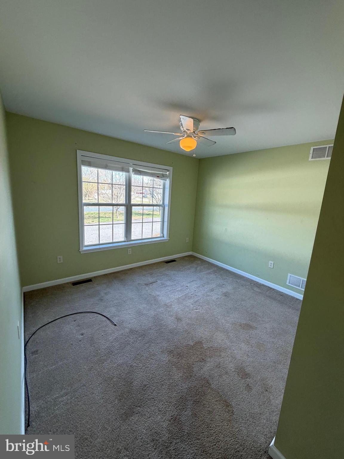 8617 Portsville Road Laurel, DE 19956 - Photo 21 of 47 an empty room with windows