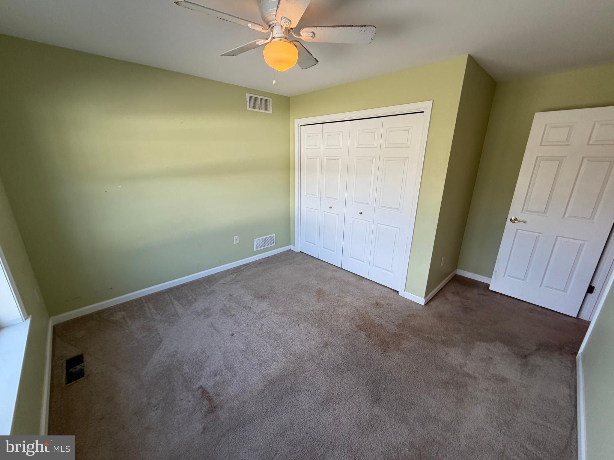 8617 Portsville Road Laurel, DE 19956 - Photo 22 of 47 a view of an empty room with a fan