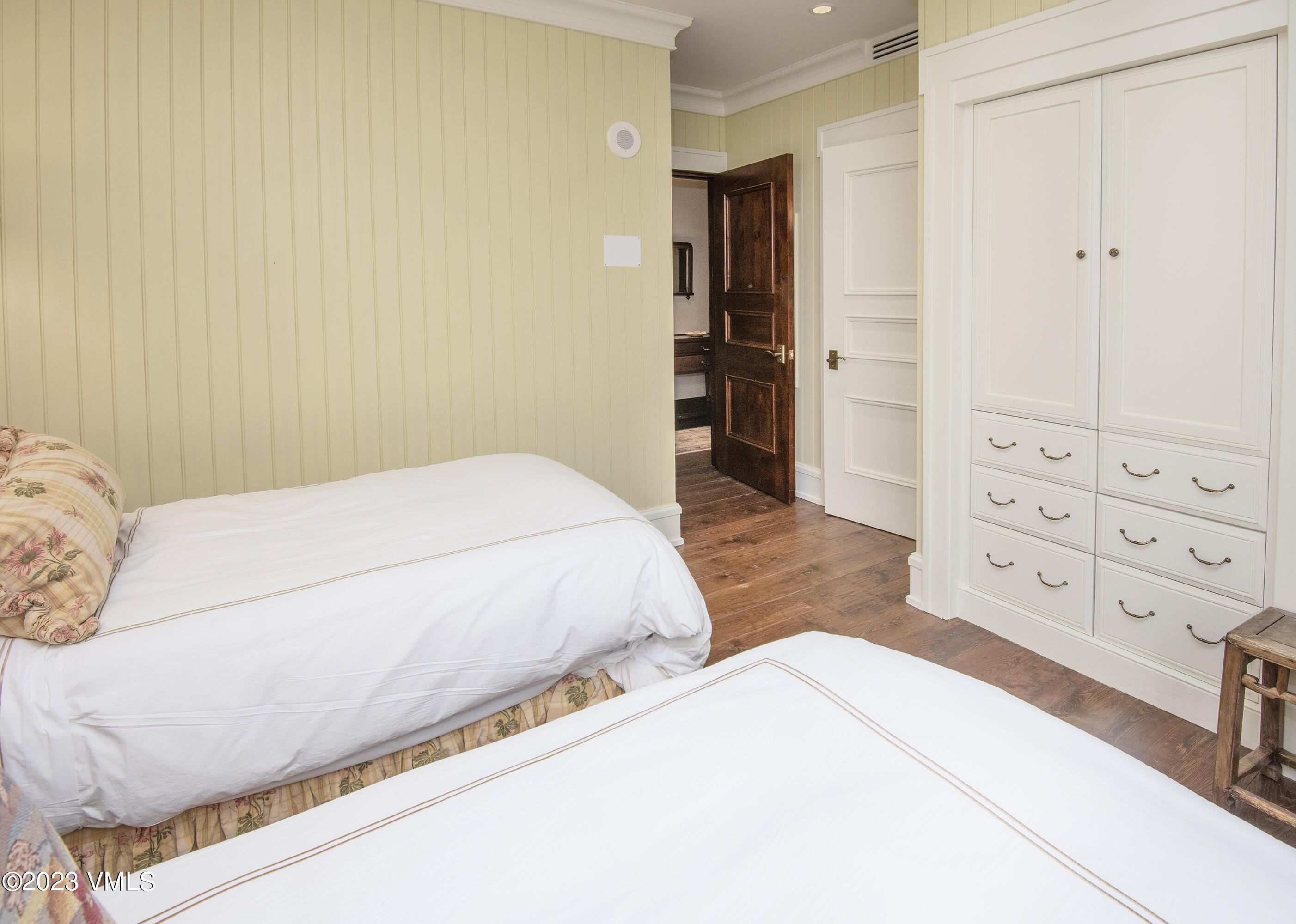 1 Willow Bridge Road, Unit 31A Vail, CO 81657 - Photo 29 of 49 a spacious bedroom with a bed and a view of bedroom