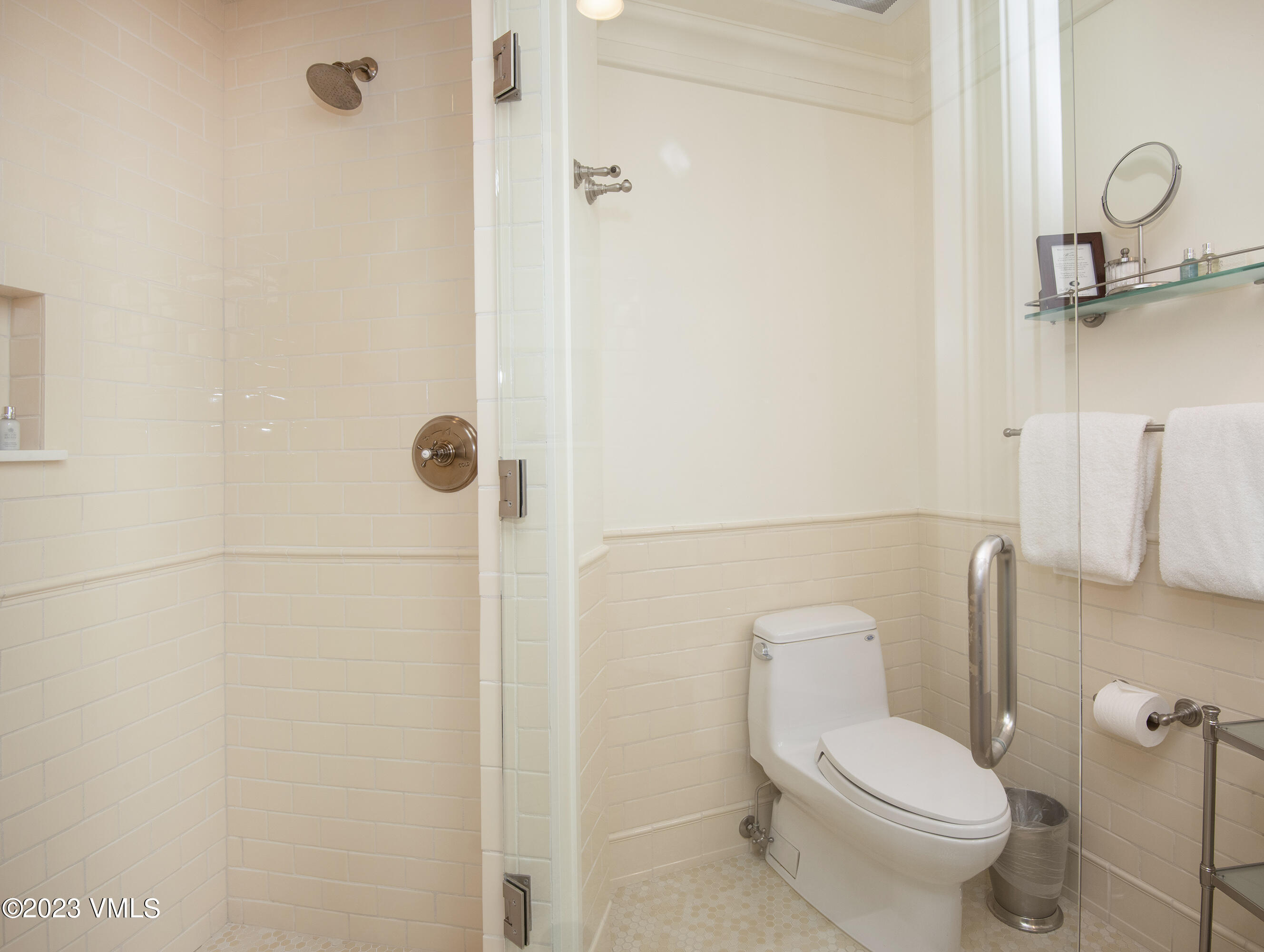 1 Willow Bridge Road, Unit 31A Vail, CO 81657 - Photo 30 of 49 a white toilet sitting next to a bathroom sink