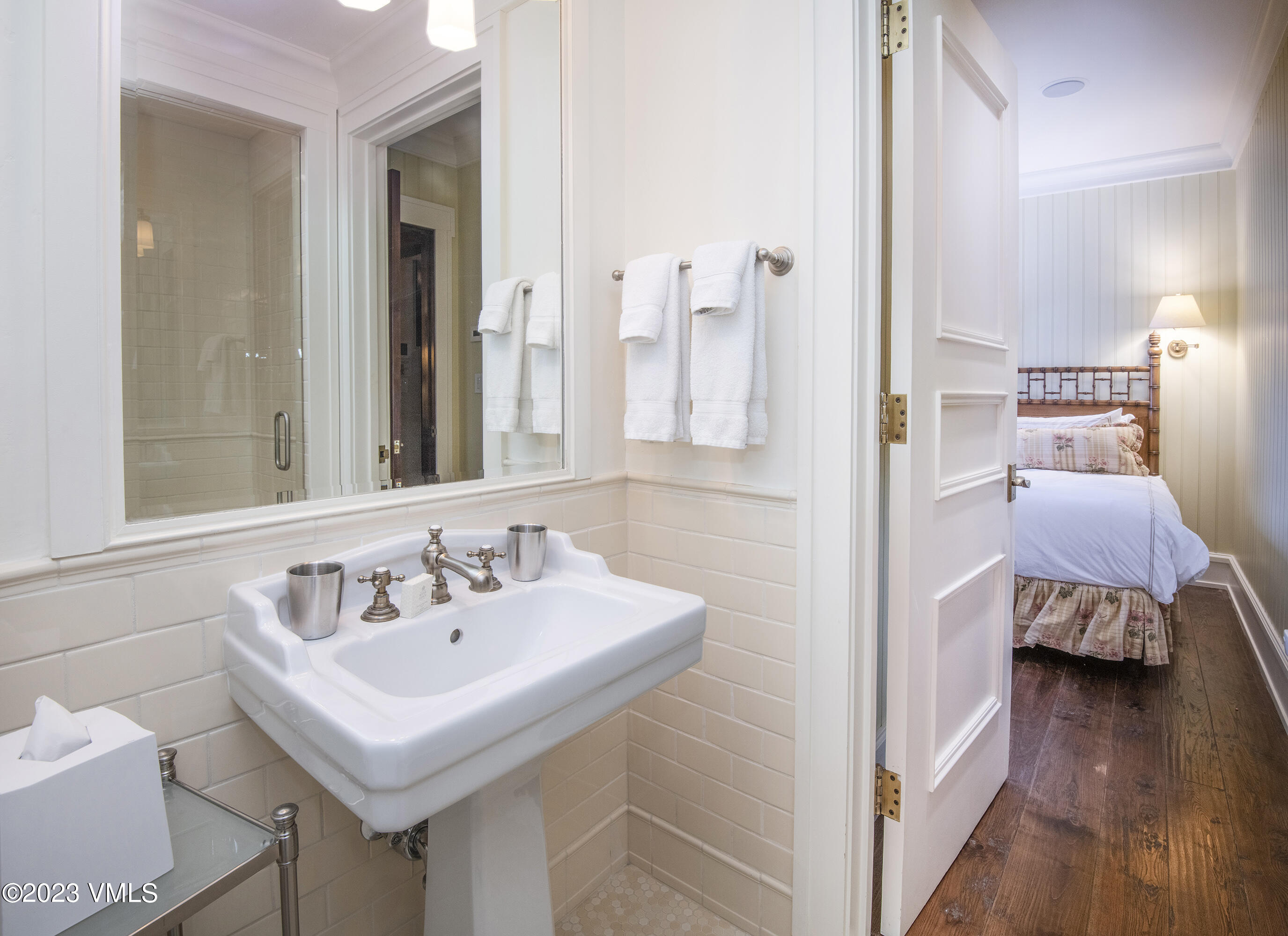 1 Willow Bridge Road, Unit 31A Vail, CO 81657 - Photo 32 of 49 a en suite bathroom with a sink and a mirror