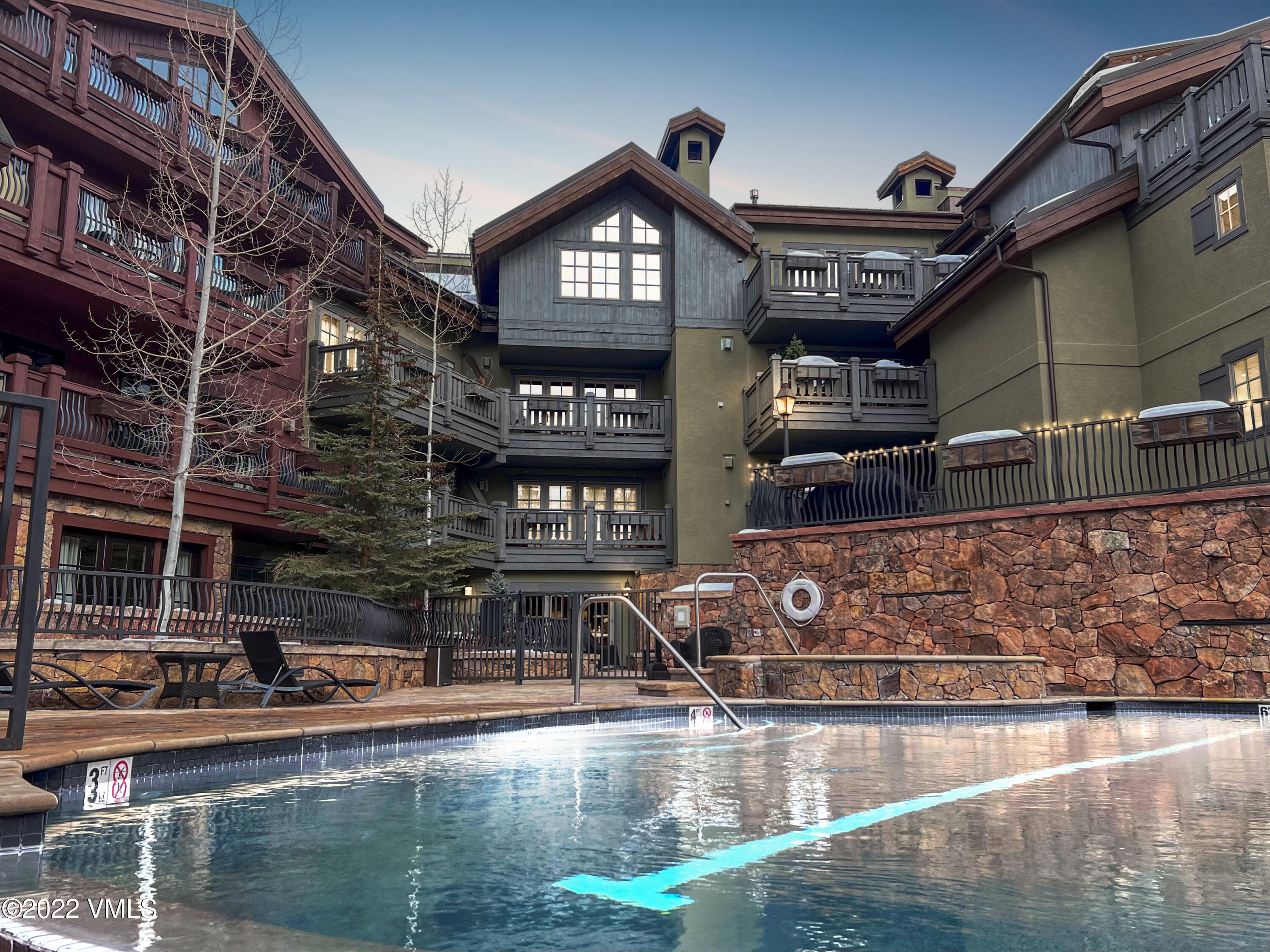 1 Willow Bridge Road, Unit 31A Vail, CO 81657 - Photo 39 of 49 a view of a house with a swimming pool