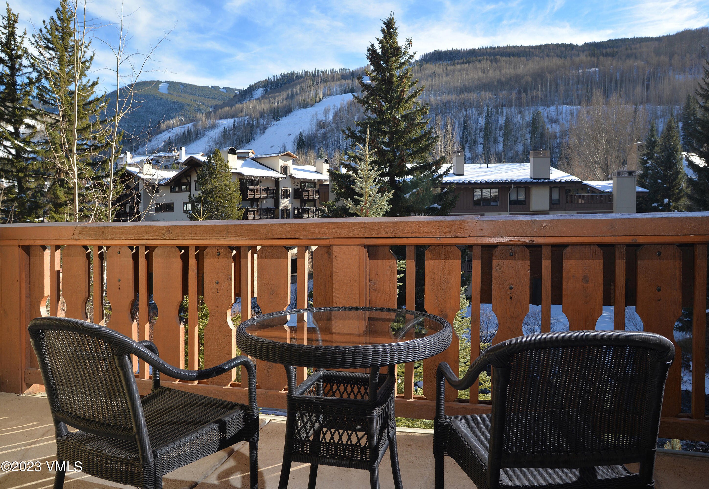 1 Willow Bridge Road, Unit 31A Vail, CO 81657 - Photo 3 of 49 a view of a chairs and table in the balcony