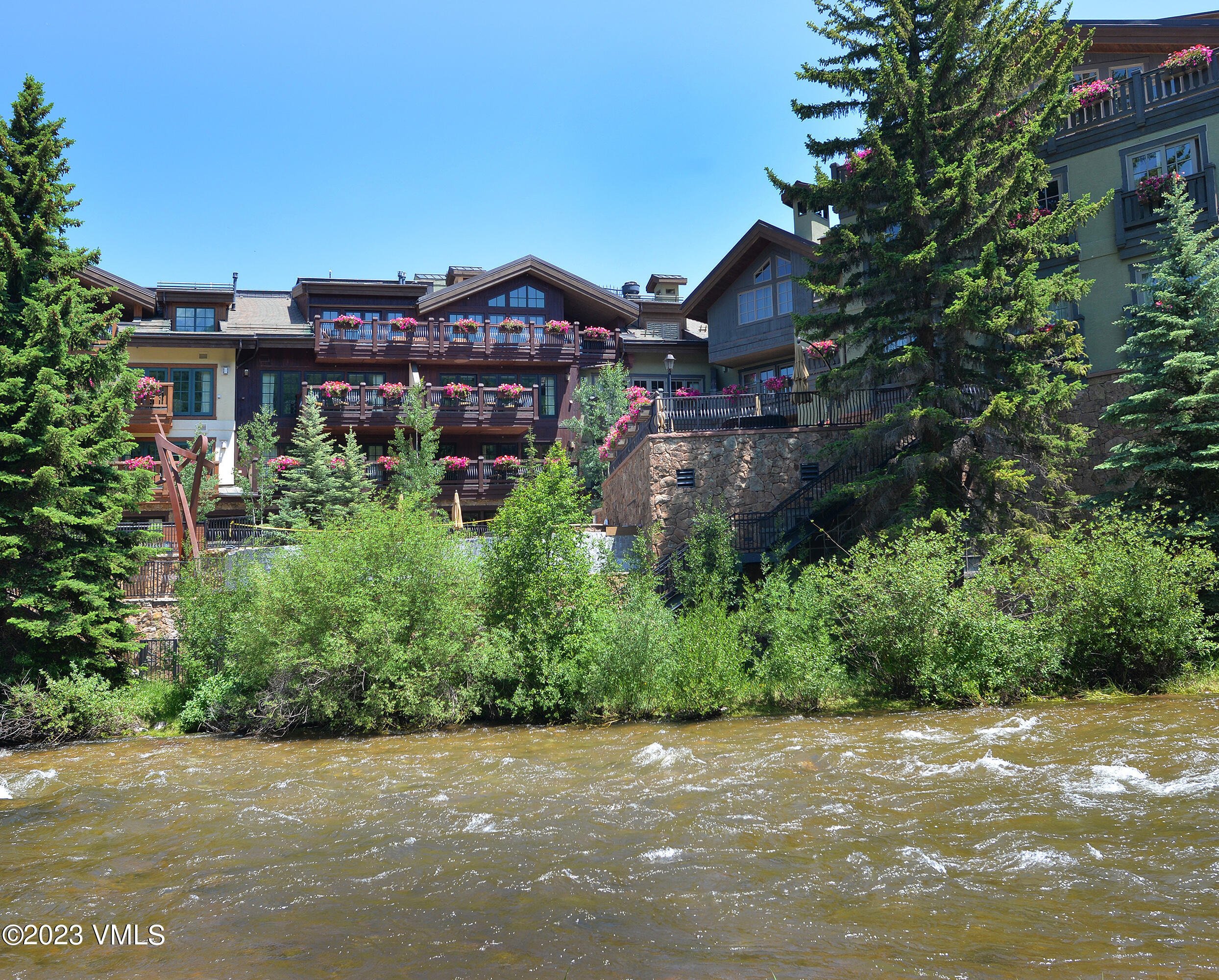 1 Willow Bridge Road, Unit 31A Vail, CO 81657 - Photo 45 of 49 a view of a house with a street
