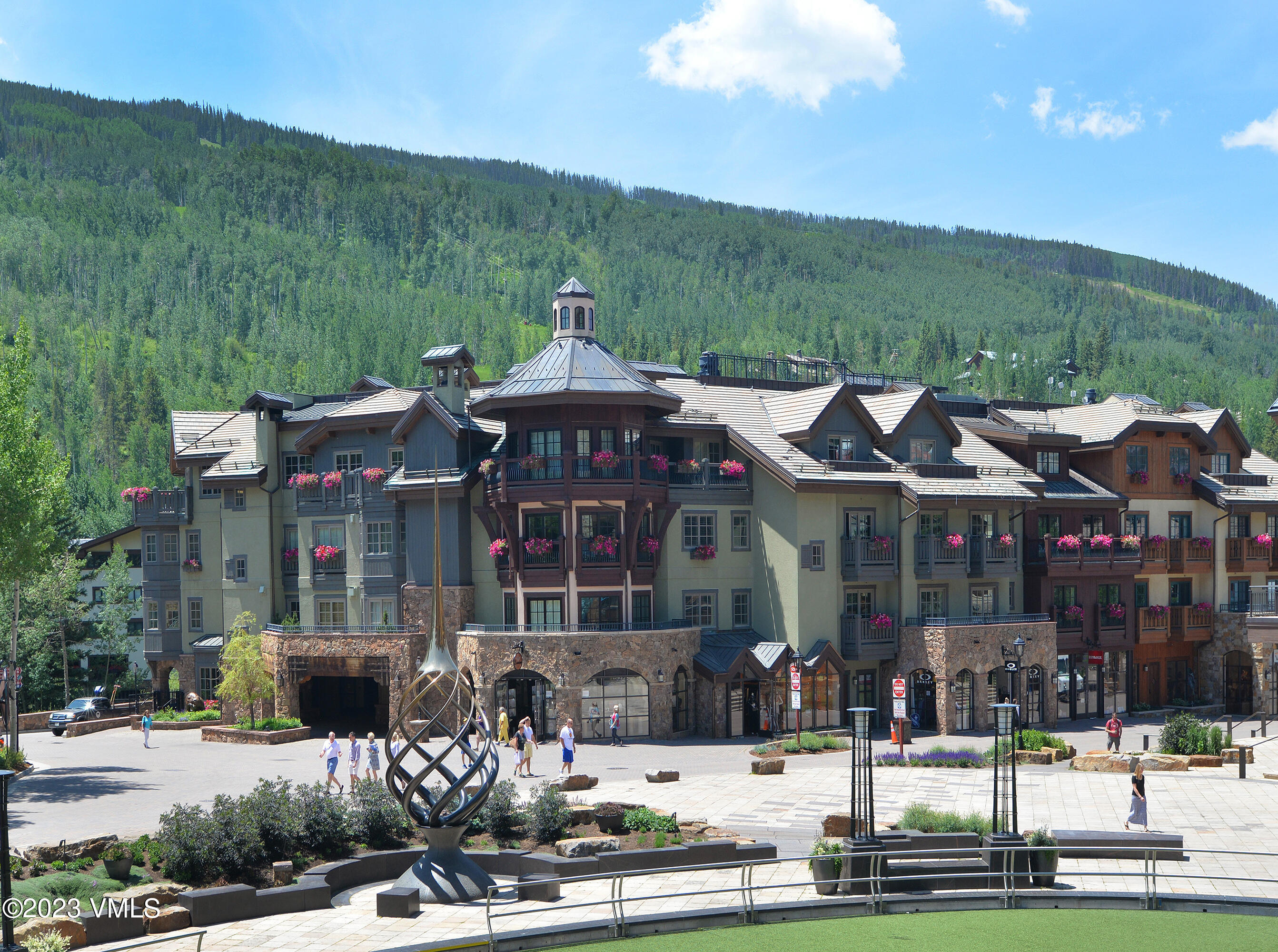 1 Willow Bridge Road, Unit 31A Vail, CO 81657 - Photo 46 of 49 a view of a town with brick building and large tree