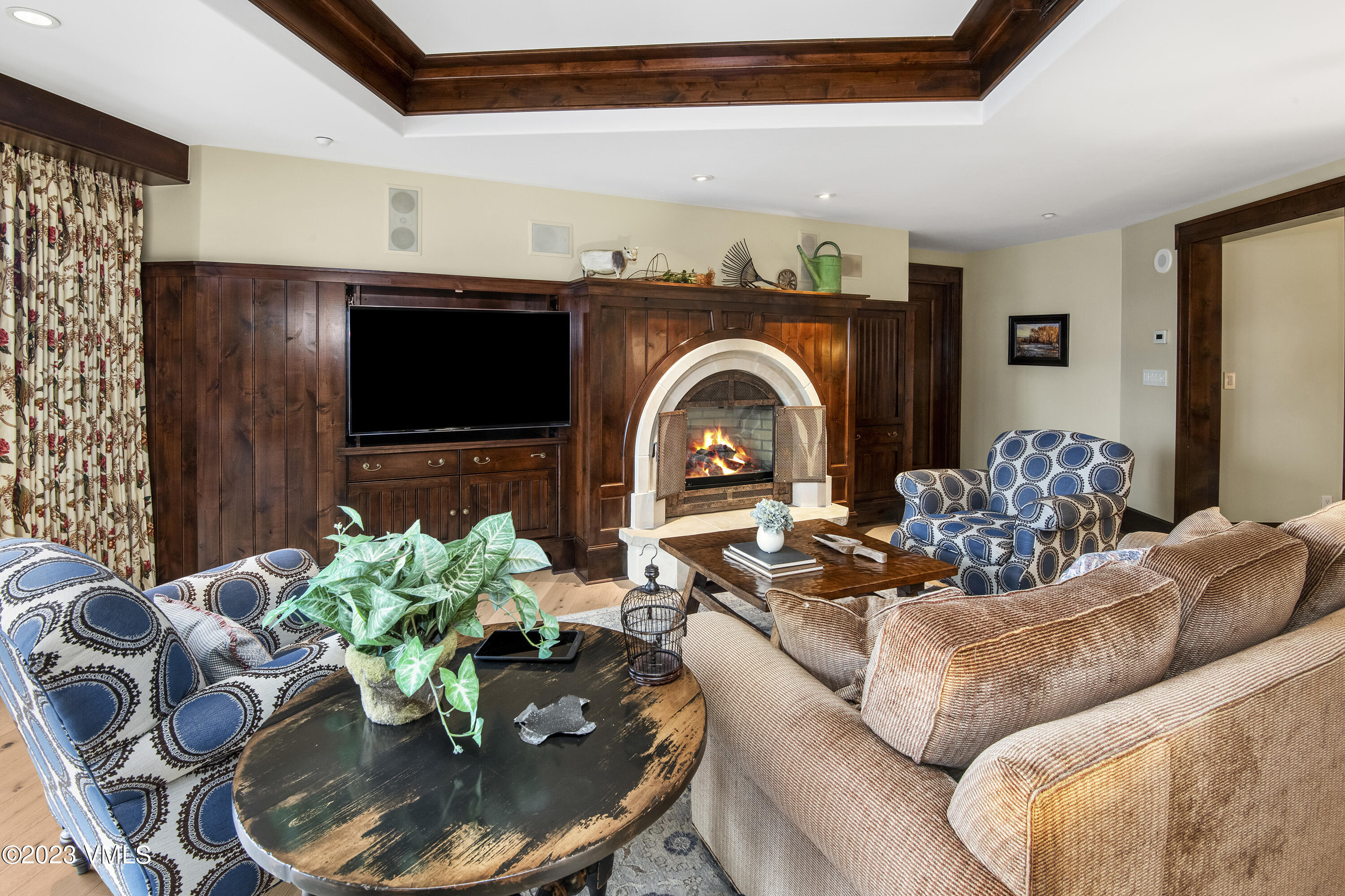 1 Willow Bridge Road, Unit 31A Vail, CO 81657 - Photo 5 of 49 a living room with fireplace furniture and a flat screen tv