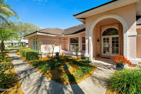 an aerial view of houses with outdoor space