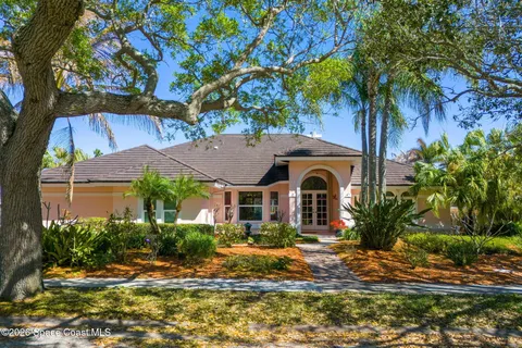 an aerial view of residential house with outdoor space and river view