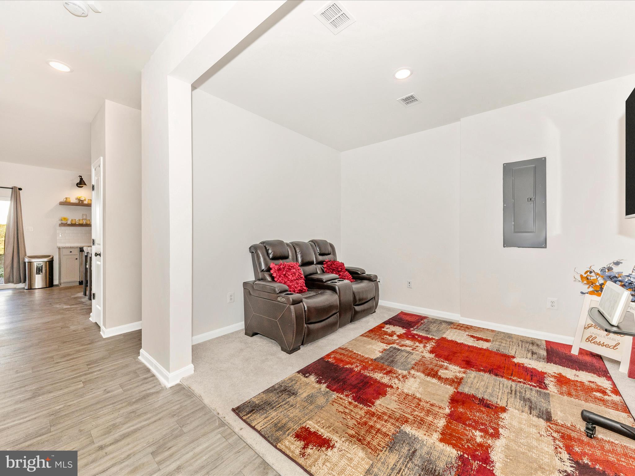76 Diving Scaup Road Hedgesville, WV 25427 - Photo 2 of 41 a living room with furniture and wooden floor