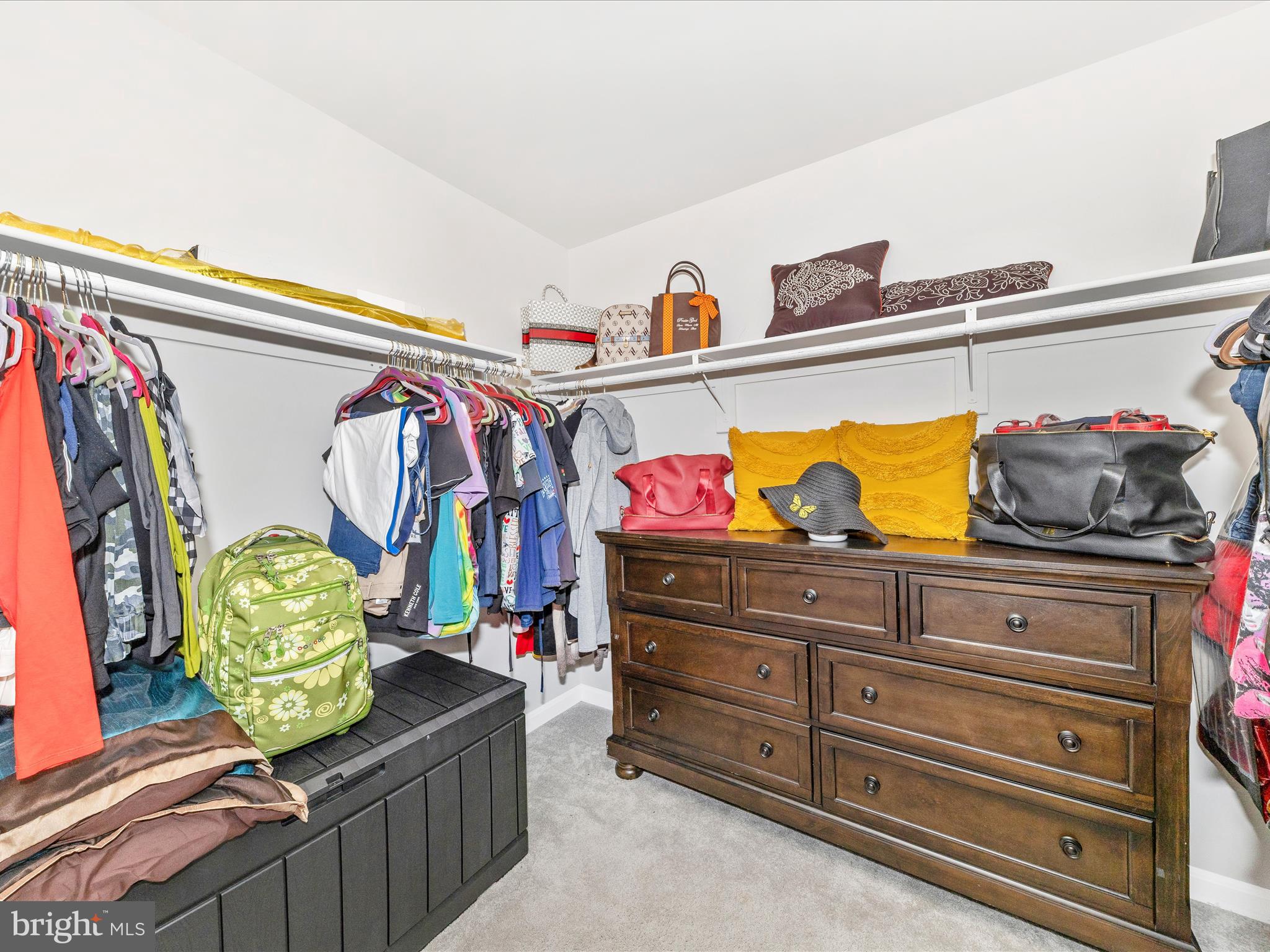 76 Diving Scaup Road Hedgesville, WV 25427 - Photo 26 of 41 a view of walk in closet with clothes and shoes