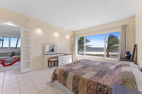 a kitchen with stainless steel appliances a refrigerator and a stove top oven
