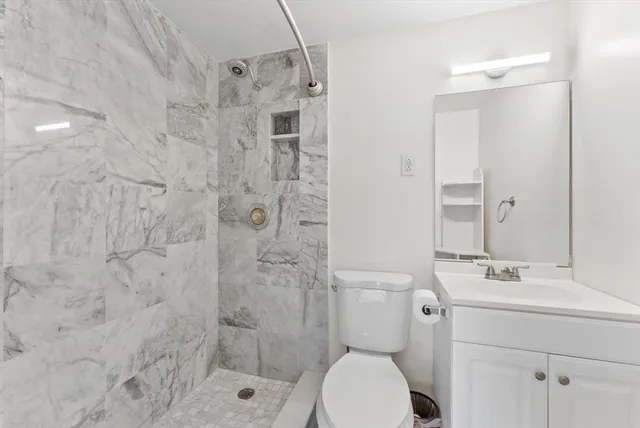 a view of kitchen with furniture and chandelier
