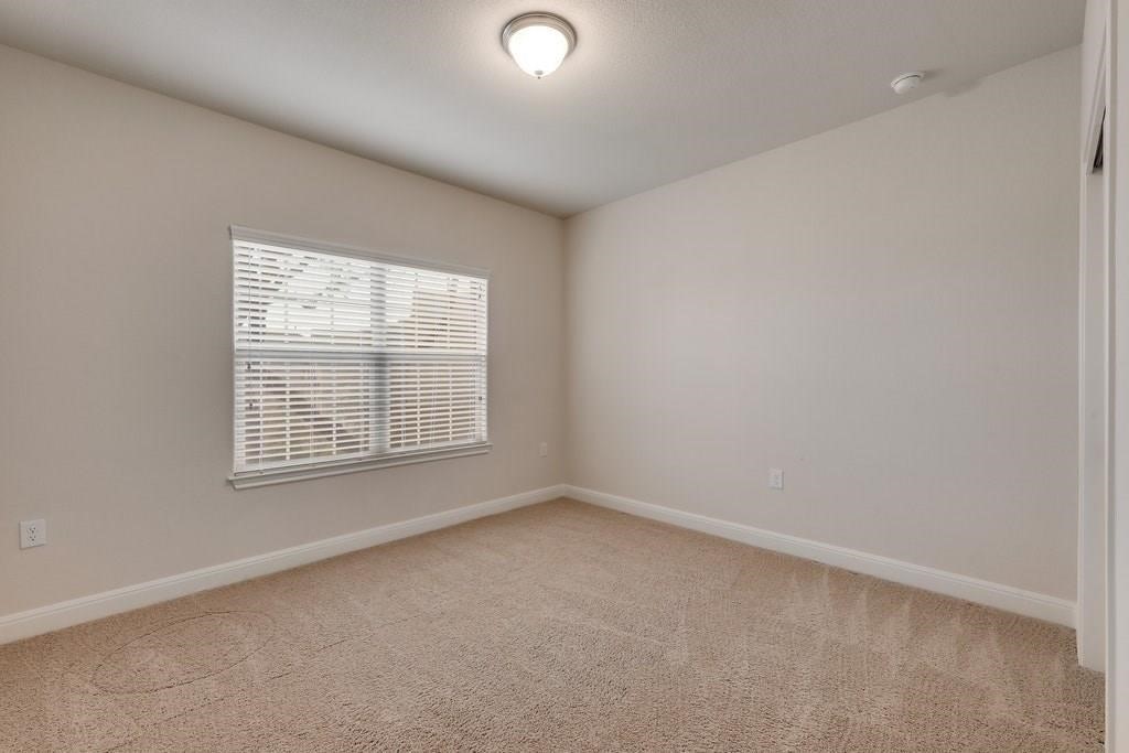 10825 Ballard Path Austin, TX 78717 - Photo 32 of 39 an empty room with a window