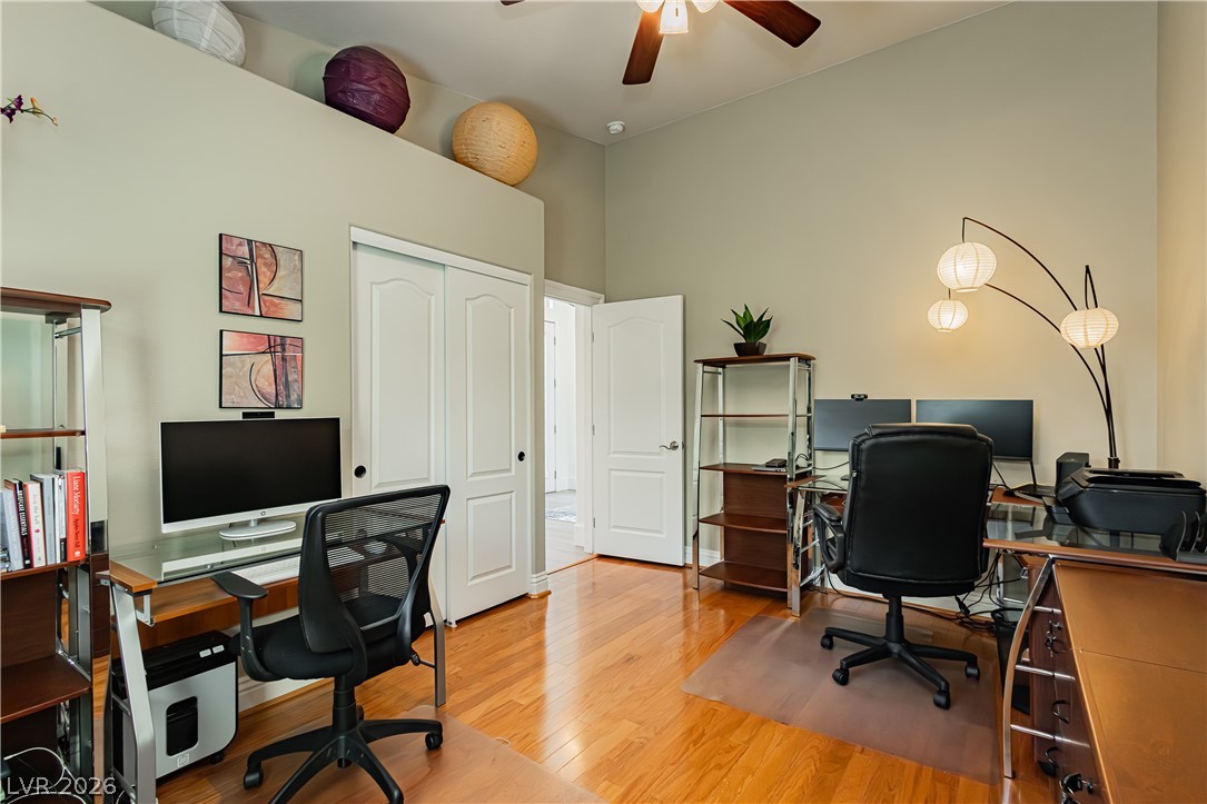 2256 Dogwood Ranch Avenue Henderson, NV 89052 - Photo 32 of 51 Hardwood floors and tall ceilings create an inviting and functional workspace.