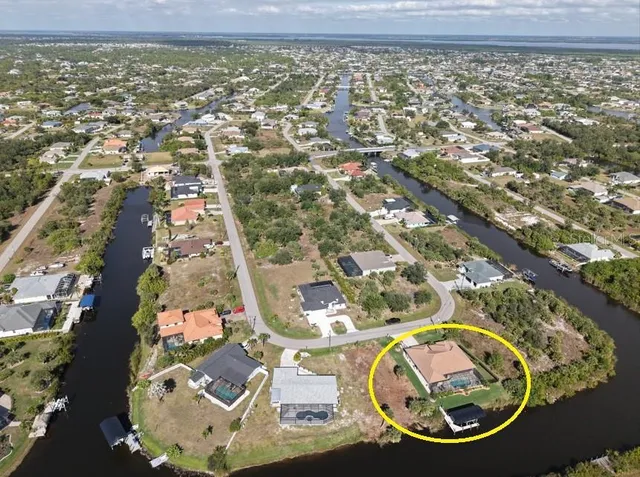 an aerial view of a highlighted house