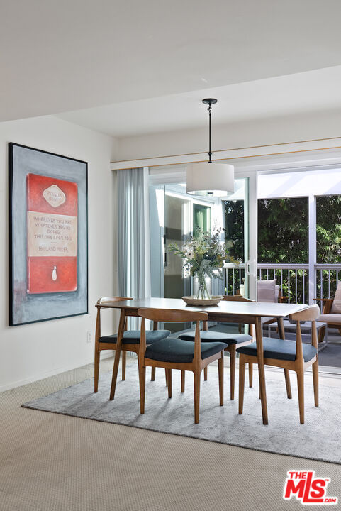 852 21st Street, Unit E Santa Monica, CA 90403 - Photo 1 of 20 a dining room with furniture window and outdoor view