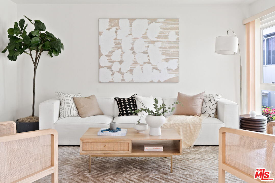 852 21st Street, Unit E Santa Monica, CA 90403 - Photo 9 of 20 a living room with furniture and a potted plant