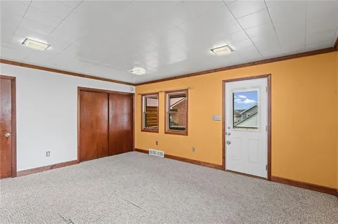 a view of an empty room with window