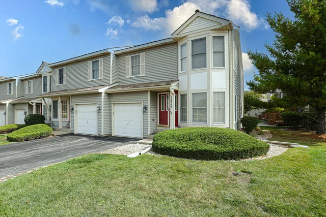 a view of outdoor space yard and front view of a house