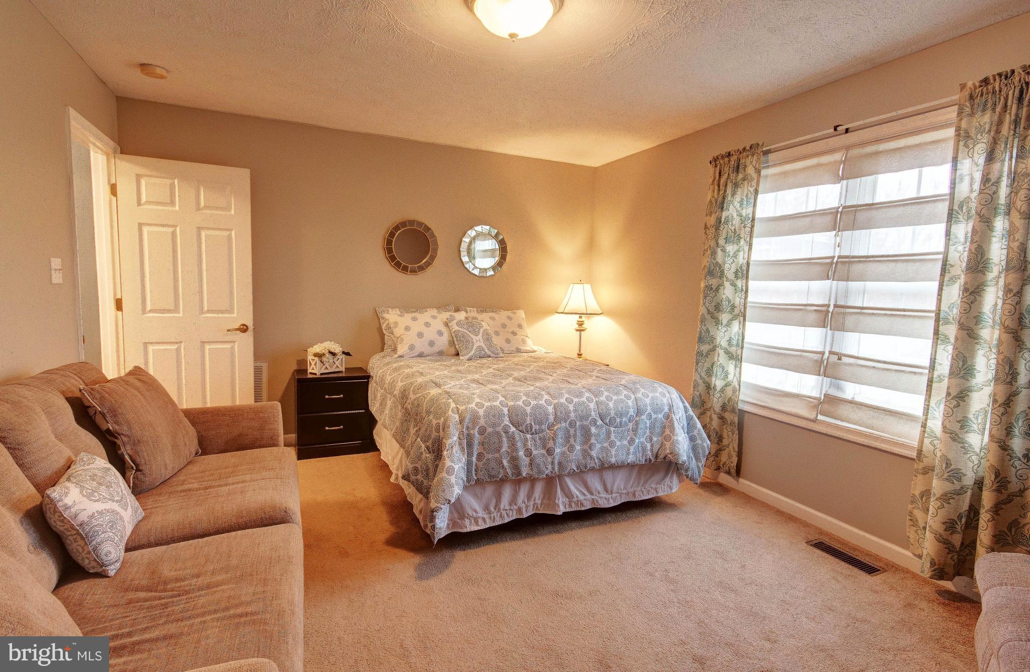 392 Oak Lee Drive Ranson, WV 25438 - Photo 21 of 27 Bedroom 2. Look how spacious!