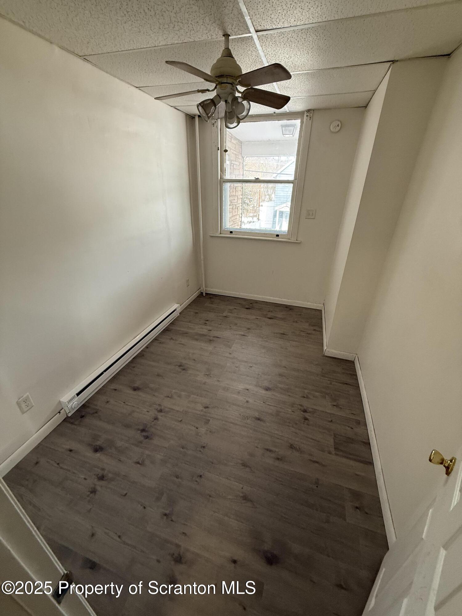 333 Spring Street Scranton, PA 18508 - Photo 3 of 8 a view of an empty room and a window